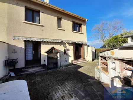 maison à rénover avec garage et terrain