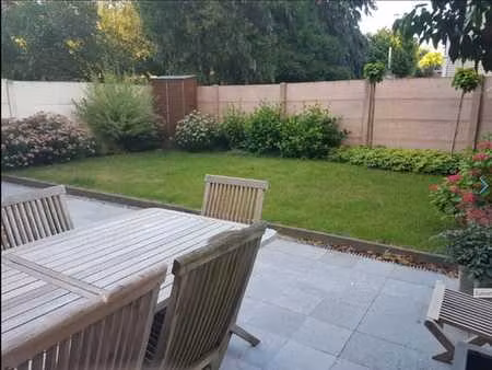 rdc avec garage  terrasse et jardin privatifs