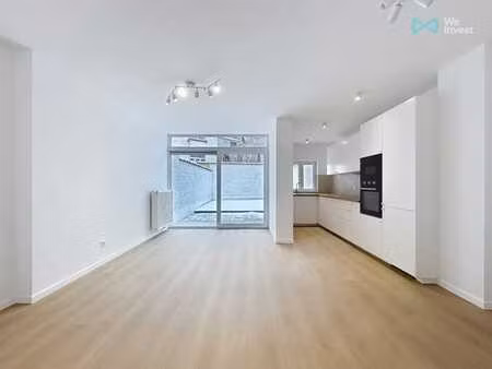 appartement lumineux avec jardin à visiter sans tarder!