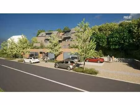 terrain avec permis pour 6 logements + 2 commerces
