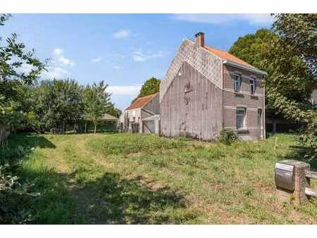 charmante renovatiewoning + bouwgrond te ranst!