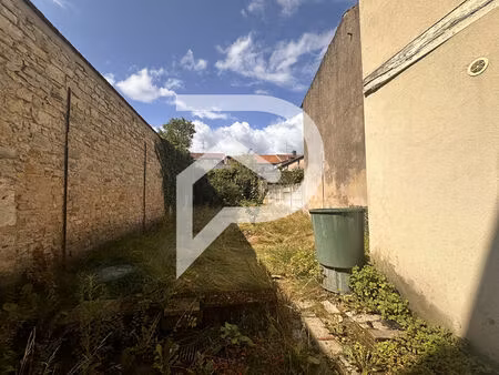 appartement avec local situé au rez-de-chaussée