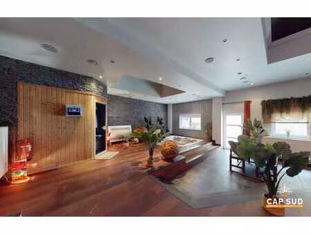 centre wellness avec espaces bien-être et cabines de soins