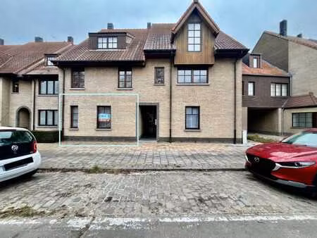 gelijkvloers appartement met twee slaapkamers en tuin