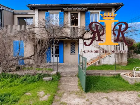 maison année 30 proche commerces avec terrasse et terrain