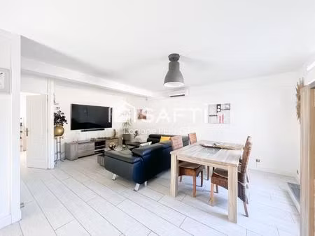 un duplex lumineux qui se vit comme une maison  avec jardin .