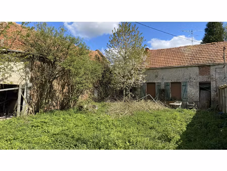 corps de ferme a renover avec patures