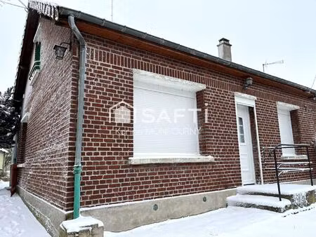 maison avec petites dépendances et garage