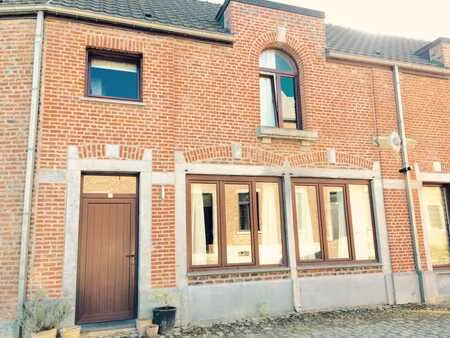 maison unifamiliale au sein d'une co-propriété