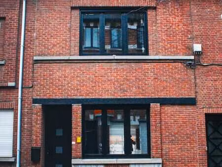 maison de ville rénovée avec jardin au centre de louvain