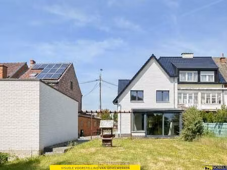 te koop  verrassend ruime halfopen bebouwing met garage e...