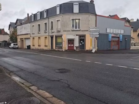 ensemble immobilier libre 829 m² – murs commerciaux + logements – bourges centre
