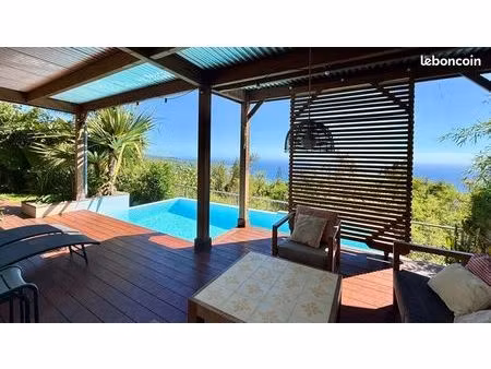 maison avec piscine  vue imprenable sur l’océan – saint-leu  colimaçons