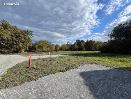 terrain 580 m² mios