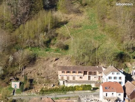 immeuble (salles + appartement + studios)