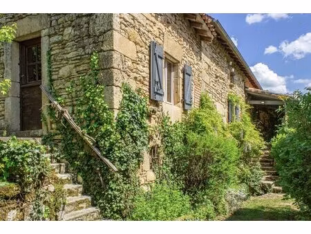 propriété d'exception à la campagne avec potentiel de revenus au cœur du lot