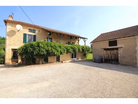 charmant ensemble en pierre avec piscine en bordure du lot