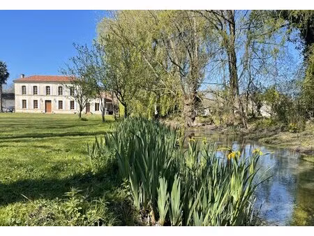 moulin avec potentiel gîte et vue sur la rivière