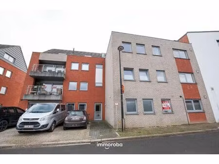 gelijkvloers appartement in centrum waregem met tuintje & garage.