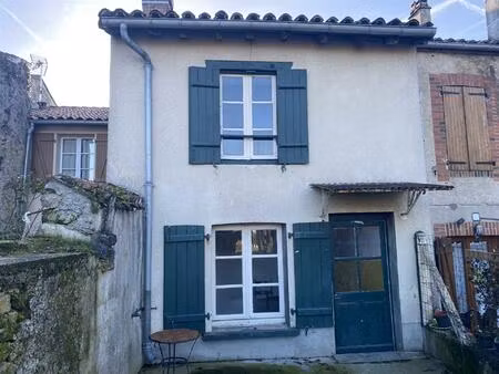 maison de ville avec jardin  proche des commerces et services