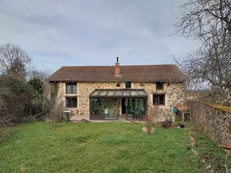 grange transformee en habitation avec agreable jardin et dependances