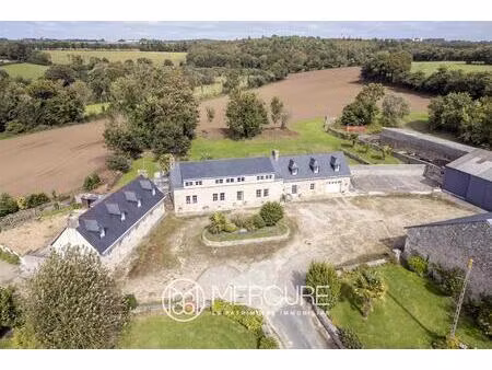 pres de quimper- ancienne ferme de trois longeres et hangars sur 1 4 ha