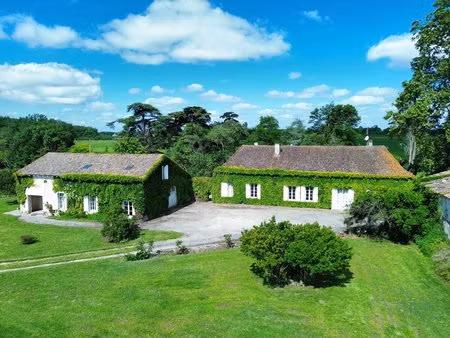 propriété avec deux maisons  3 ha et dépendances au calme