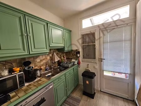 maison 3 niveaux terrain