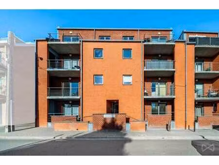 lumineux appartement au rdc avec 2 ch  balcon et parking!