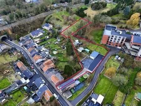 ensemble immobilier polyvalent (garages + entrepot+ terrain)