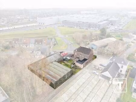 twee woningen + serres te melle!!