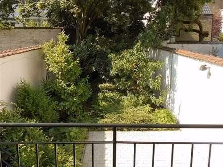 quartier européen - appart 1 ch avec terrasse et jardin