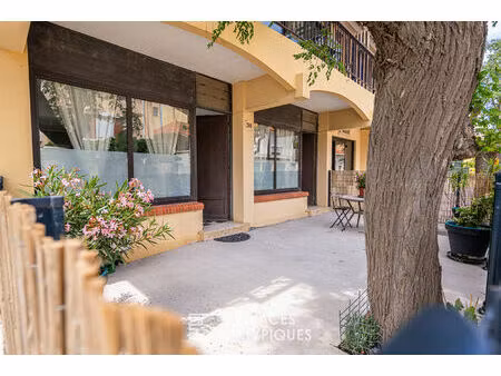 ancienne boutique réhabilitée en appartement de charme avec terrasse