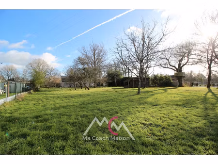 fegreac en village  terrain à bâtir d'environ 1200m2