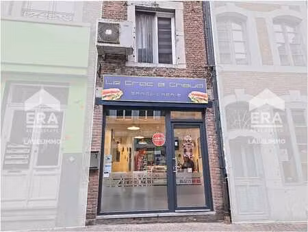 maison de commerce avec bail en cours au centre de huy