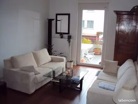 superbe rez de jardin dans une maison de caractère