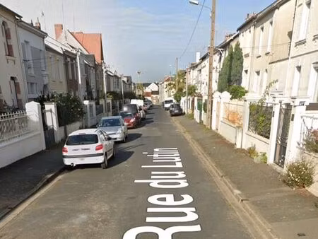 quartier du lutin  maison années 30 avec garage et jardin