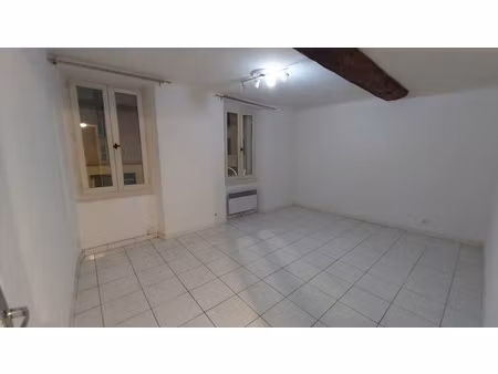 appartement + murs libres de local commercial + garage