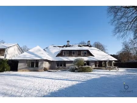 villa met praktijk of kangoeroewoning en zuid - west tuin.