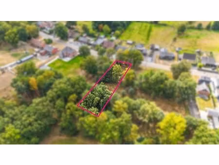 ruim en groen gelegen bouwperceel (13a) voor open bebouwing!