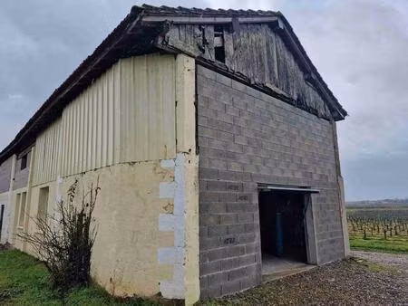 garage et atelier attenant avec dépendances sur un terrain de 1036m2