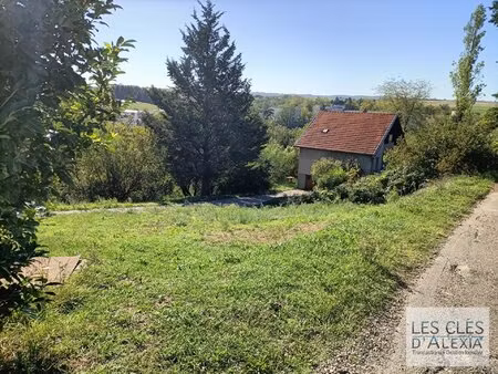 terrain 637m²- viabilisé- vue