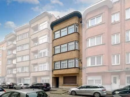 une maison de rapport comprenant 4 logements