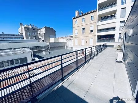 grand t2 de 48 m² env. climatisé avec une belle terrasse de 40m² + box sécurisé en sous-so