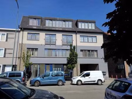 immeuble avec 4 appartements 3 chambres + 2 garages (1400m2)