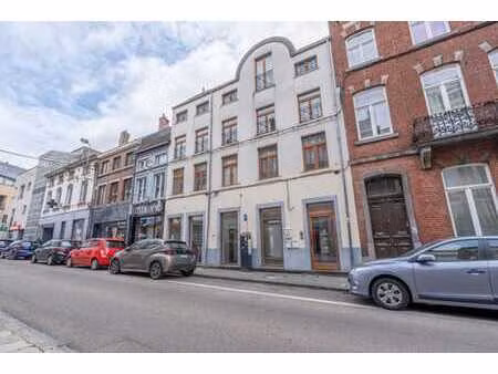 immeuble mixte avec rez commercial et 3 appart. au centre