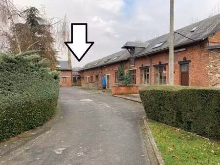 ds une copropriété  petite maison 1 ch & parking privatif