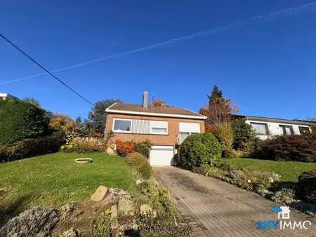 charmante maison 4 façades avec jardin et garage à visé