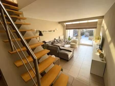 gezellige  lichtrijke rijwoning met tuin