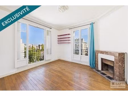 bécon. 2 pièces lumineux en angle au dernier étage.